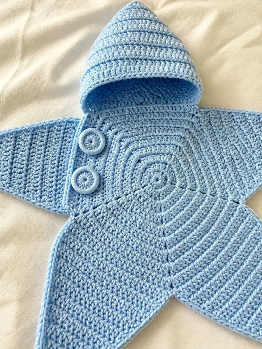 Hand-crocheted starfish suit in Sky Blue, close-up