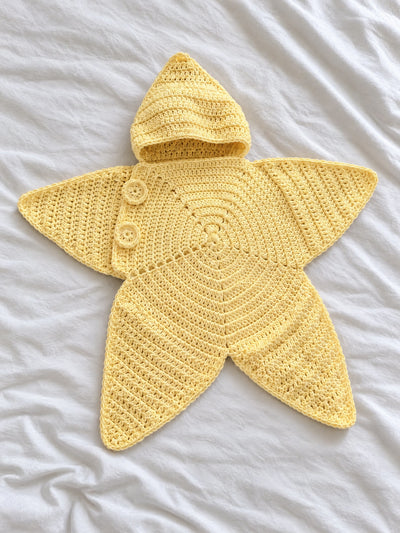 Hand-crocheted starfish suit in Sunshine Yellow, flat lay